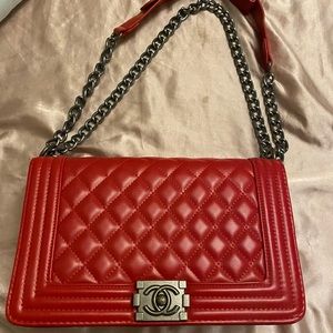 Beautiful ruby red purse not authentic